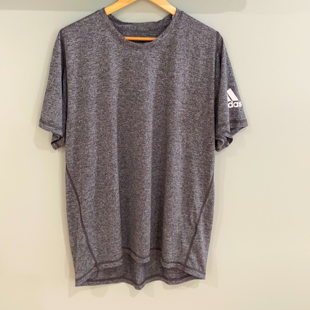 Men’s Adidas shirt in size XL.